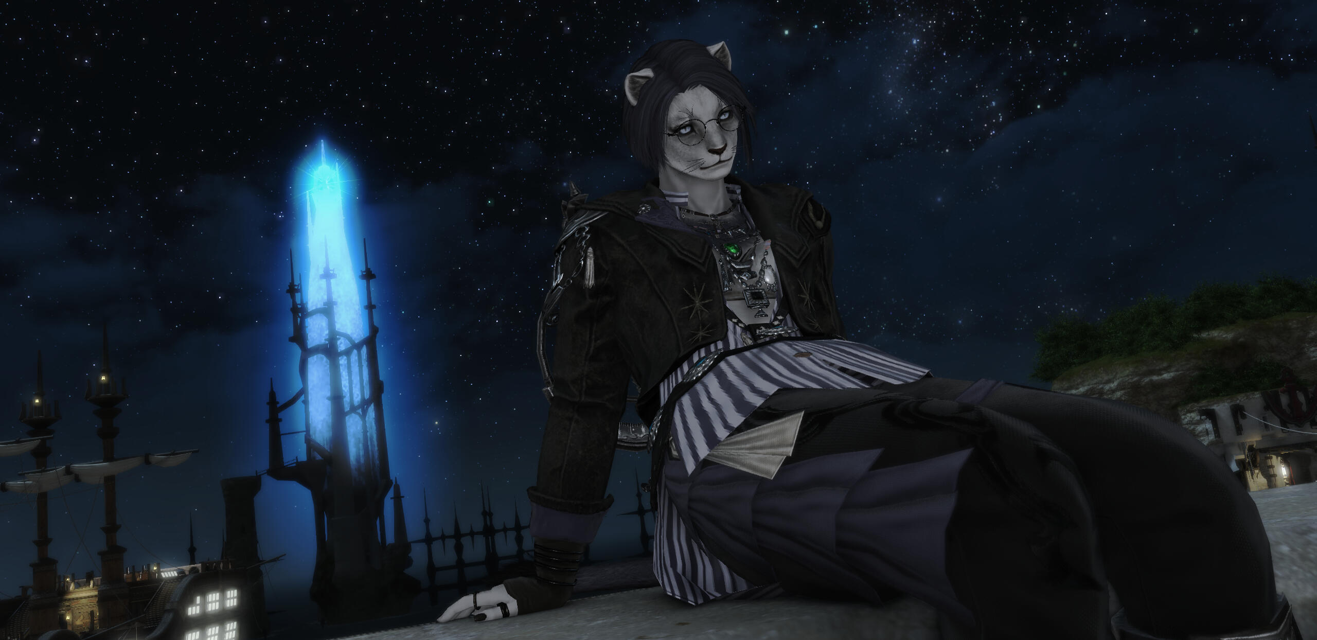 Kreja walks through Ishgard in the dead of night, with the moon looming overhead.